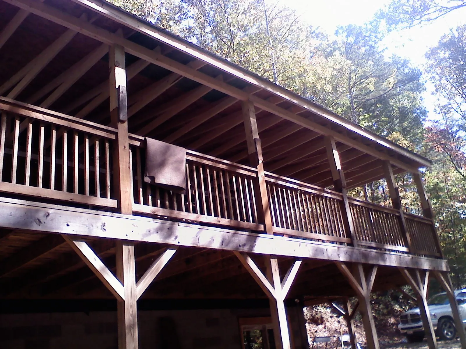 Timber framing under a new elevated porch and deck — Roof Leak Repair in Sale City by Roofing Brothers